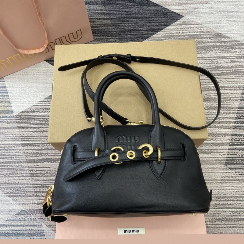 G*u*i top handle bags
